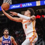 Atlanta Hawks forward Jalen Johnson (1) shoots against the Philadelphia 76ers in overtime at State Farm Arena.