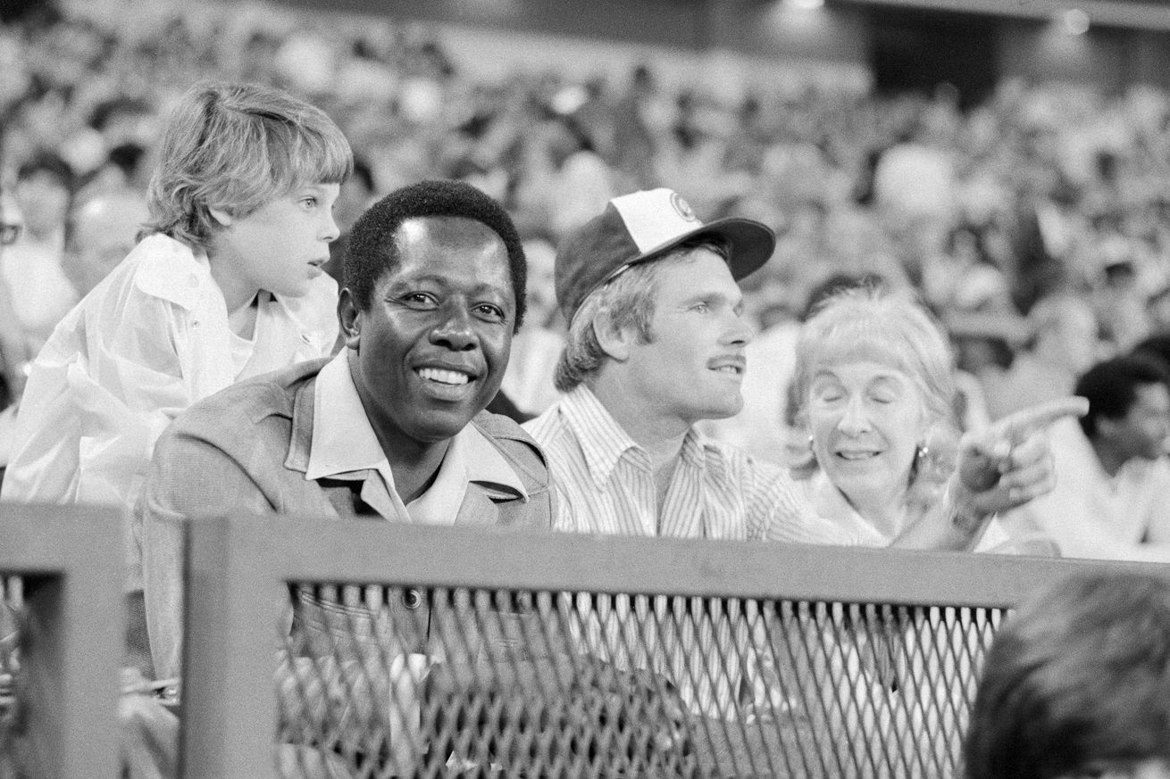 Hank Aaron and Ted Turner Watching Baseball Game