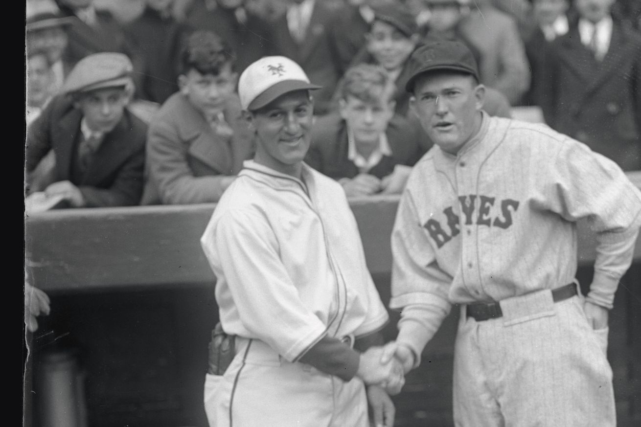 Andy Cohen and Rogers Hornsby Shaking Hands